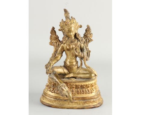Gilded Oriental/Chinese bronze Buddha figure on lotus flower. Dimensions: H 21 cm. In good condition.