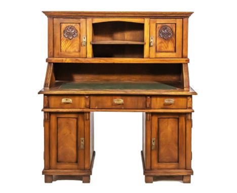 Writing desk on purpose. Circa 1920. Solid oak. Base with two doors and three drawers. Upper doors with carving. Dimensions: 