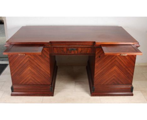 Large rosewood writing desk. Art Deco. Circa 1935. With two extendable writing surfaces and two doors with drawers + central 