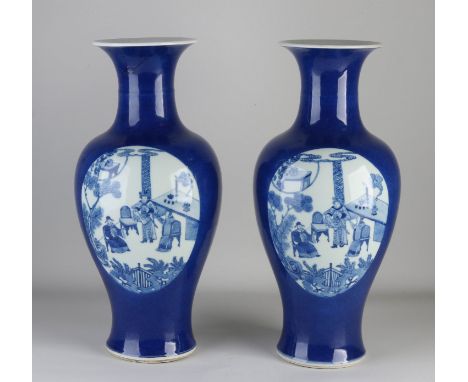 Two large 19th century Chinese porcelain vases with figures in a garden/bird in a tree decor. With double blue bottom ring. O