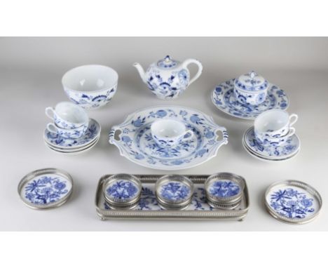 Antique German Zwiebelmuster service. Marked with two swords and H. Circa 1900. Consisting of: cups and saucers, teapot, bowl