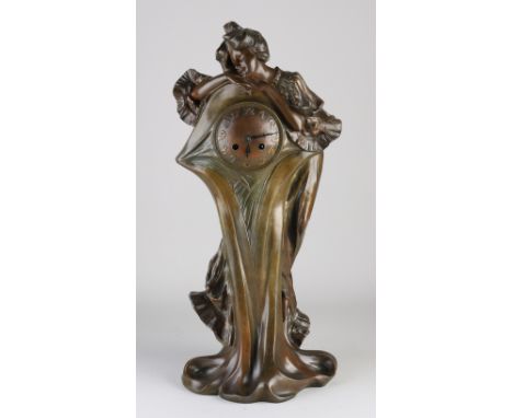 French Art Nouveau mantel clock. Circa 1900. Composition metal, bronze-coloured patina. Eight-day movement, half-hourly strik