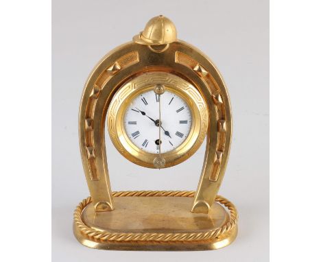 Antique French Vorderzappler desk clock made of brass. With horseshoe and jockey cap. Circa 1900. Dimensions: H 14 cm. In goo