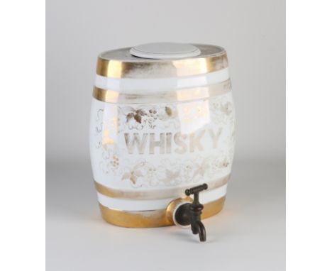 Antique English whiskey barrel with bronze tap. Circa 1900. Dimensions: 27 x 21 x 14 cm. In good condition.