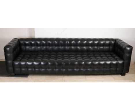 Large Italian four-seater black leather design sofa. Dimensions: 70 x 76 x 260 cm. In good condition.