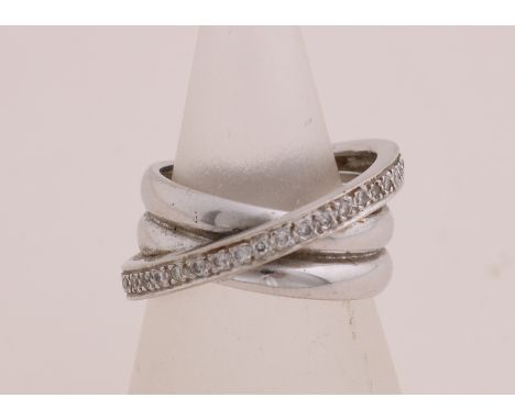 Wide white gold ring, 750/000, with diamond. Ring with 2 convex bands with a diagonal band set with brilliant cut diamonds on