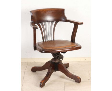 Antique rotating Jugendstil desk chair made of beech wood with leather seat. Circa 1910. Dimensions: 80 x 61 x 50 cm. In good