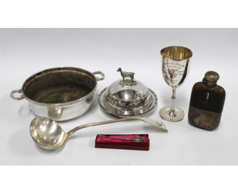 A box containing Victorian and later Epns wares to include a ladle, goblet, hip flask, etc 