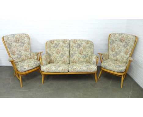 An Ercol light elm Windsor three piece suite, with loose cushions 142 x 83cm, chairs 74 x 104cm (3) 