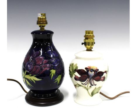Moorcroft Anemone pattern baluster table lamp, tube line decorated to a blue ground with a fixed wooden base, 14 x 27cm toget