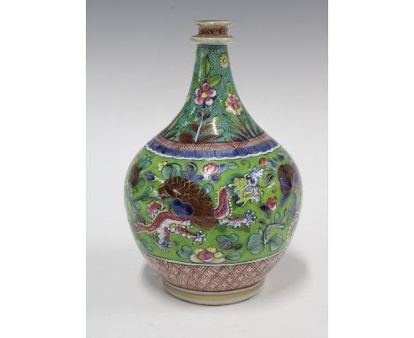 Chinese polychrome glazed jar / vase of bottle neck form with bulbous body, painted with birds and flowers to an apple green 