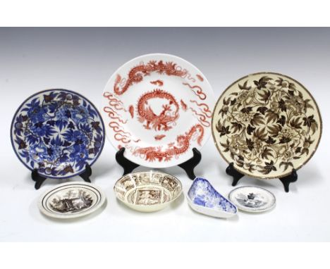 A group of 18th and 19th century Staffordshire transfer printed pottery plates and saucers together with a small blue and whi