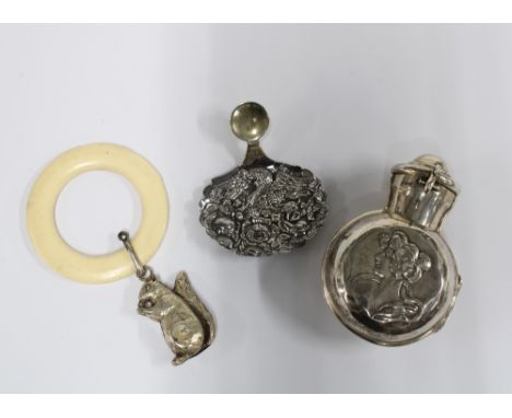 Silver squirrel rattle with faux ivory teething ring, Chester 1955, silver caddy spoon and an early 20th century silver flask