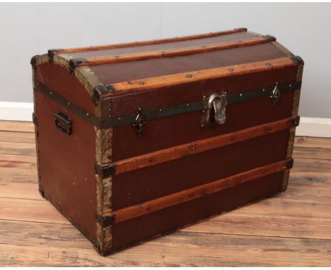 A vintage wood and metal bound steamer trunk. The lock stamped for Eagle Lock Co, USA. W82 x H59 x D49cm  