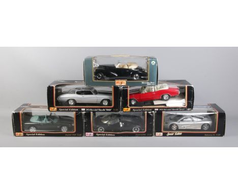 Six 1:18 scale Maisto Speicial Edition vehicles. Including Ford GT90, McLaren F1 and Jaguar XK8.  