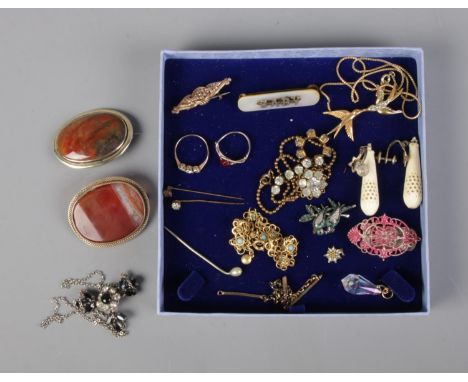 A quantity of vintage costume jewellery including necklaces, rings, earrings and brooches.  