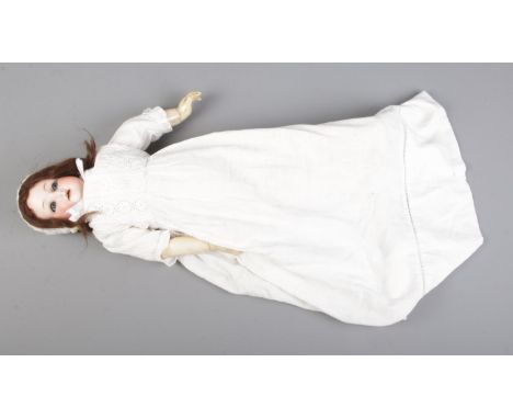 An Armand Marseille bisque doll, 390 DRGM A 2.1/2M.  