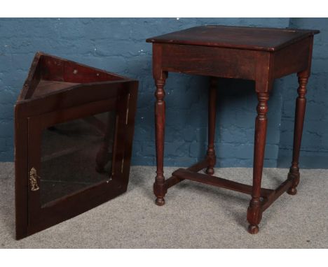 A vintage oak writing desk along with a wall mounted corner cupboard.  