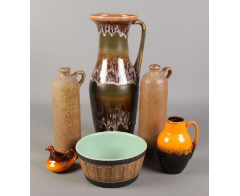 A collection of pottery. Includes large Kingston Pottery drip glaze jug, stoneware bottles, Pearsons planter etc.  