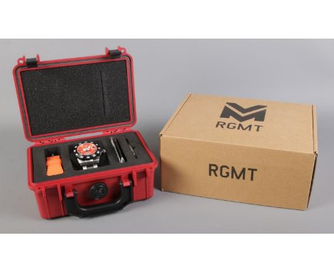A new, boxed and cased Limited Edition (0777/1600) RGMT Ohio 3000m Water-Resistant Automatic wristwatch in Orange, on stainle