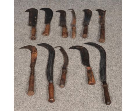A collection of vintage sickles and billhooks, to include examples by makers Elwell, B. Whitehouse and Sons and Vaughan Bros.