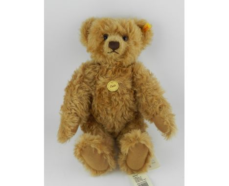 Steiff, Germany, a mohair teddy bear, entitled 'Classic Teddy Bear', having the original Steiff button and tag, and the origi