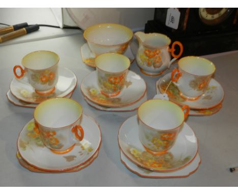 Shelley, England, a tea set comprising of five cups and saucers, and six sandwich plates, and a milk jug and sugar bowl