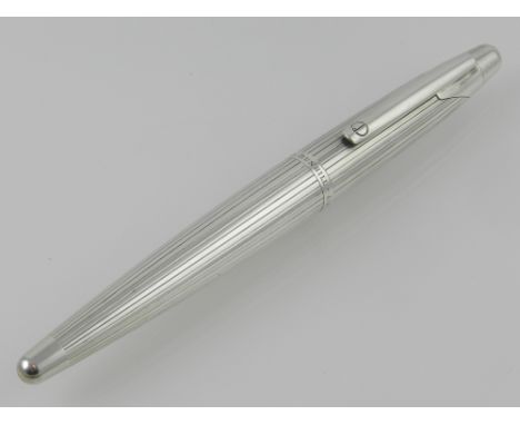 A silver plated Dunhill fountain pen, engraved Alfred Dunhill, having an 18ct gold nib