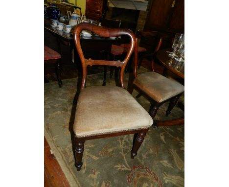 A set of six early Victorian rosewood button back dining chairs, having brown Dralon stuff over seats, raised on turned taper