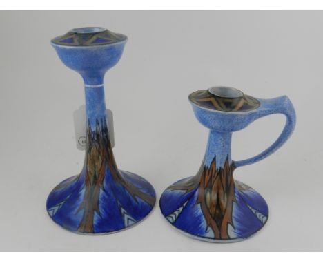 Clews & Co., Tunstall. A chameleon ware pottery candlestick H.18cm, together with a similar chamber stick H.12cm