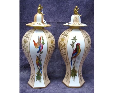 A Pair of Rockingham (Brameld) Earthenware Hexagonal Vases and Covers, each with a monkey finial, the slender inverted balust