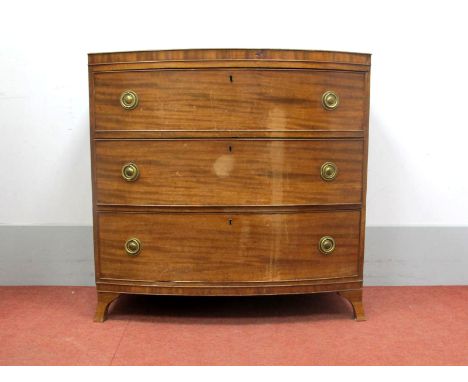 An Early XIX Century Mahogany Bow Fronted Chest of Drawers, with moulded edge, three long drawers, on bracket feet, 87cm high