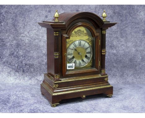 An Early XX Century Mahogany Cased Mantel Clock, with brass face and silvered chapter ring with Roman numerals and applied sc