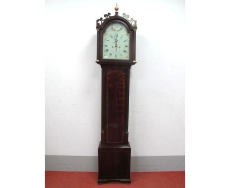 An XVIII Century Mahogany Eight-Day Longcase Clock, with arched hood, applied fretwork decoration and column supports, the ar