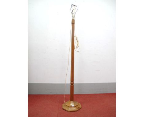 A Robert Thompson (Mouseman) Oak Standard Lamp, with octagonal column and stepped base, carved mouse signature, 144cm high.