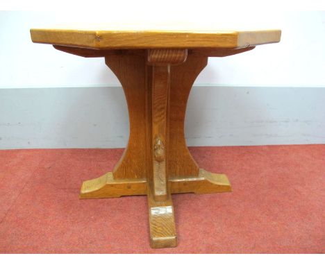 A Robert Thompson (Mouseman) Oak Octagonal Coffee Table, on cruciform base, carved mouse signature, 47cm high.