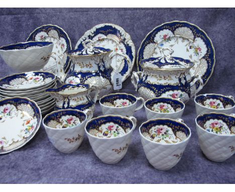 A Rockingham Porcelain Coffee and Tea Service, moulded basketweave decoration and painted with colourful floral sprays within