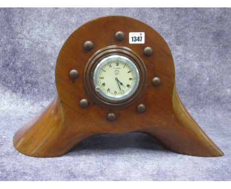 An Interesting Early XX Century Jaeger Car Dashboard Clock, believed to be from a Bugatti, the silvered dial with Roman numer