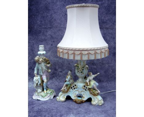 A Late XIX Century German Porcelain Table Centrepiece Base, (converted to a table lamp), the triangular base applied with mus