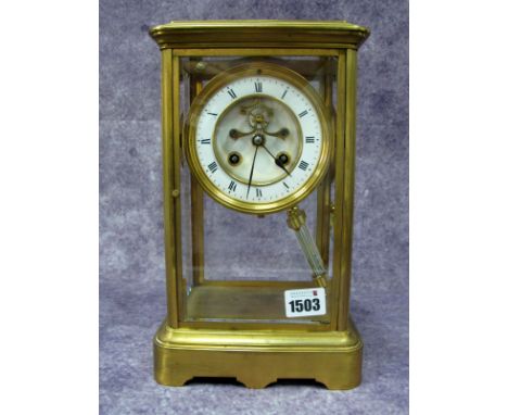 A Late XIX century Lacquered Brass Cased Four Glass Mantel Clock, with mercury pendulum, the dial with white enamel band and 