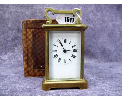 An Early XX Century French Brass Cased Carriage Clock, the white enamel dial with Roman numerals, 11cm high, with key, in ori