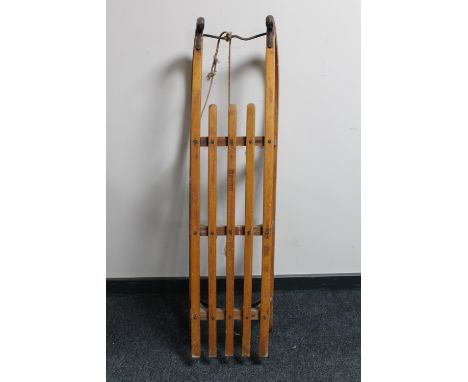 A vintage 20th century wooden sledge 