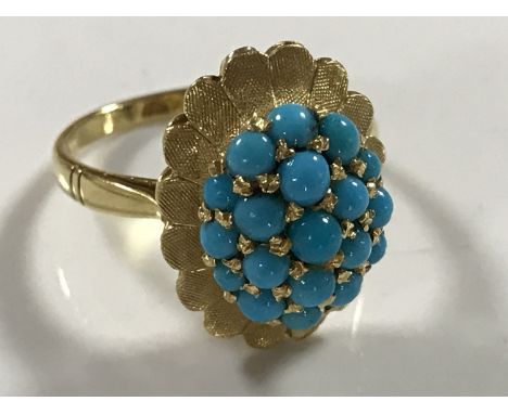 A yellow gold turquoise set ring, indistinctly marked, 5.4g, size N/O.