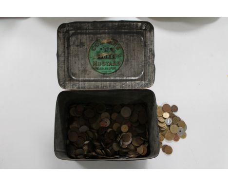 A vintage Colmans Mustard tin containing foreign coins 