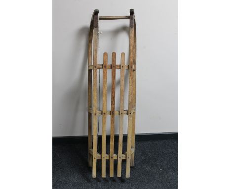 A vintage 20th century wooden sledge 
