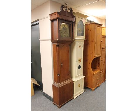 An antique oak longcase clock with brass moonphase dial, pendulum and weights 