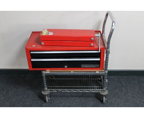 A metal two tier trolley together with International tools two drawer chest containing spanners 