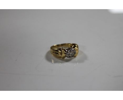 A continental yellow gold ring set with diamonds, indistinctly stamped, 3.4g, size H.