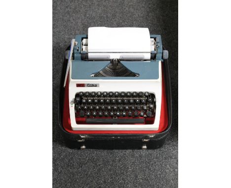 An Aro Erica typewriter in leather case 