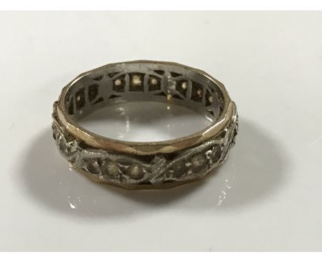 A 9ct gold diamond set eternity ring, 2.8g, size K.